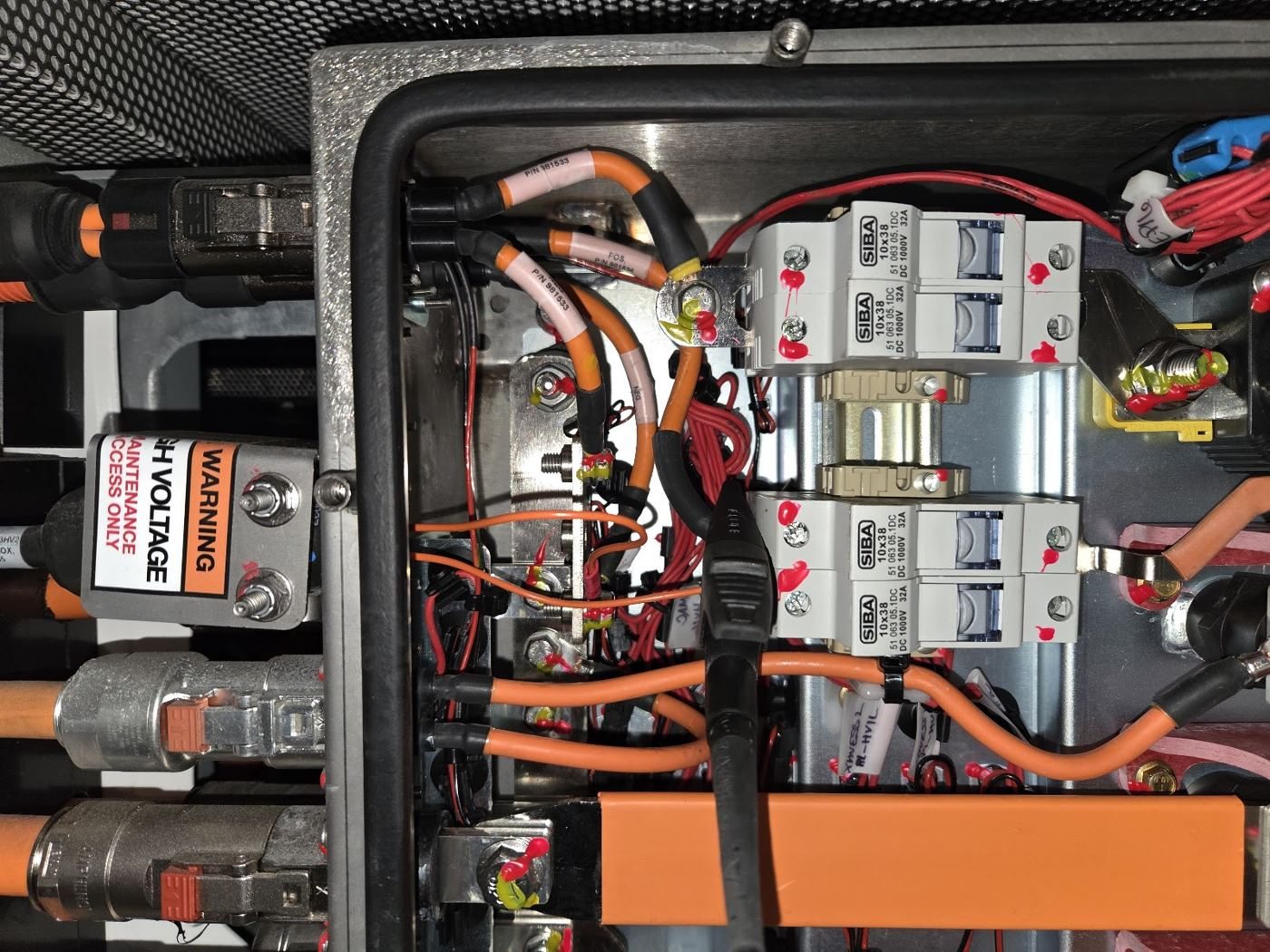 High voltage junction box with fuses, connectors and orange cabling